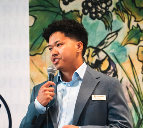 Leland Remias, Co-Founder and CEO of VroomBrick, speaking at an event in Hampton Roads, Virginia.